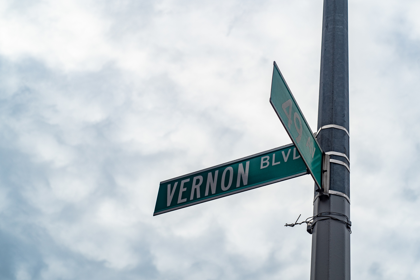 Vernon Boulevard and 49th Avenue Street Signs